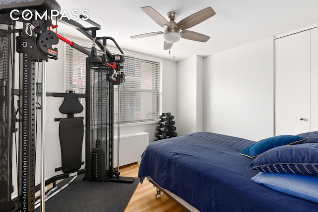 444 E 86th St Unit 11H, New York City, NY 10028 - bedroom with wood finished floors and a ceiling fan