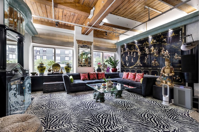 205 E 22nd St Unit 2L, New York City, NY 10010 - carpeted living area featuring a wooden ceiling with exposed beams