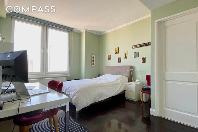 404 E 76th St Unit 30A, New York City, NY 10021 - bedroom featuring dark wood-style floors, ornamental molding, a desk, and baseboards