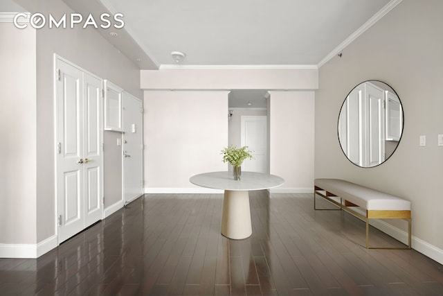 404 E 76th St Unit 30A, New York City, NY 10021 - hall with baseboards, ornamental molding, and dark wood-style floors