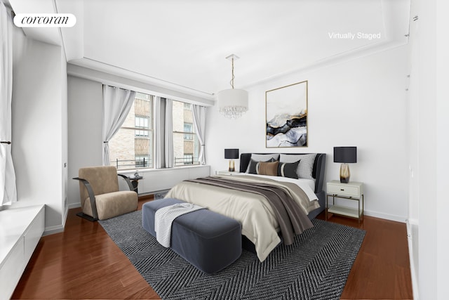 55 Wall St Unit 730, New York City, NY 10005 - bedroom featuring wood finished floors and baseboards