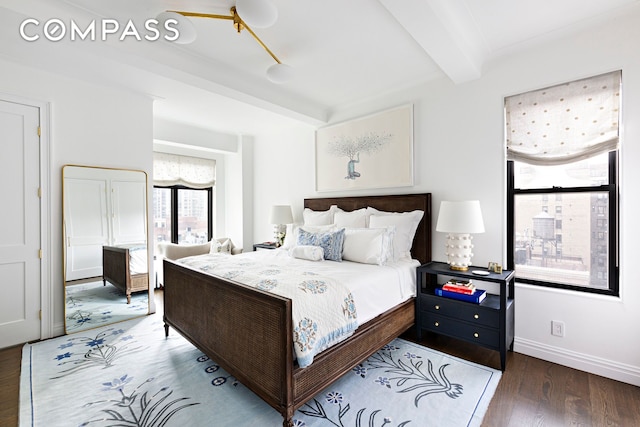 975 Park Ave Unit 14D, New York City, NY 10028 - bedroom featuring beam ceiling and wood finished floors
