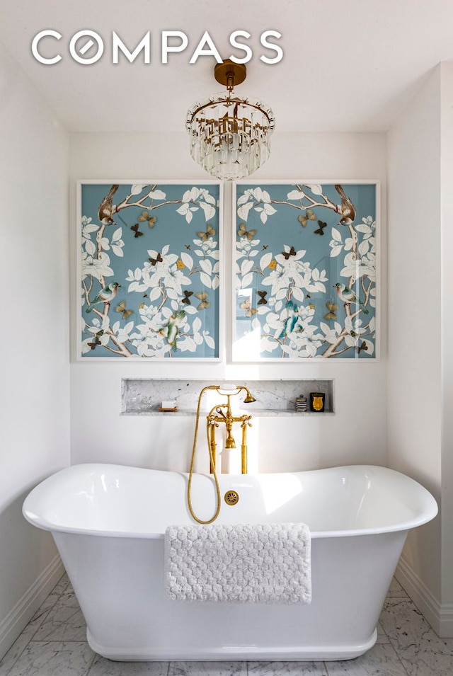 975 Park Ave Unit 14D, New York City, NY 10028 - bathroom with marble finish floors and a freestanding bath