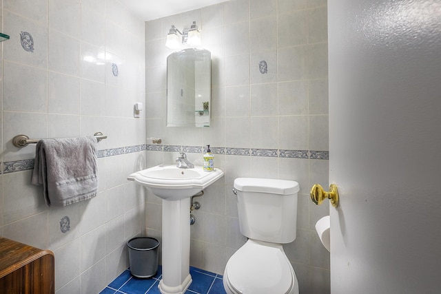315 W 232nd St Unit 3-C, New York City, NY 10463 - half bath featuring tile walls and tile patterned flooring