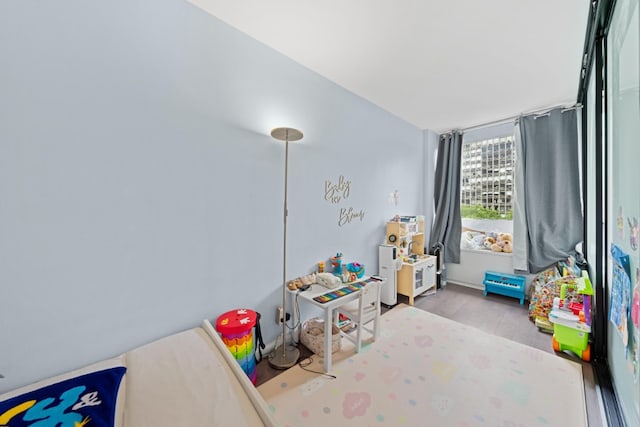 330 E 33rd St Unit 7B, New York City, NY 10016 - recreation room featuring wood finished floors