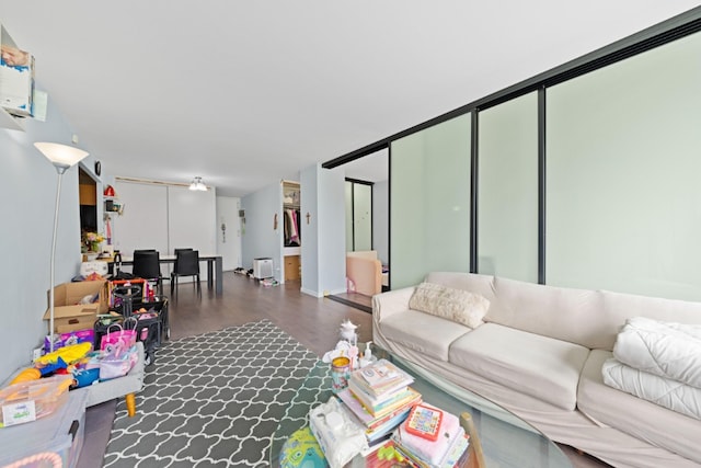 330 E 33rd St Unit 7B, New York City, NY 10016 - living room featuring dark wood-style flooring
