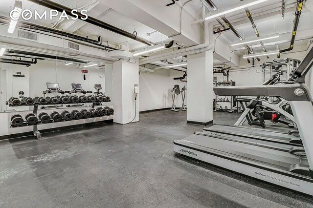 176 W 87th St Unit 1H, New York City, NY 10024 - exercise room with baseboards