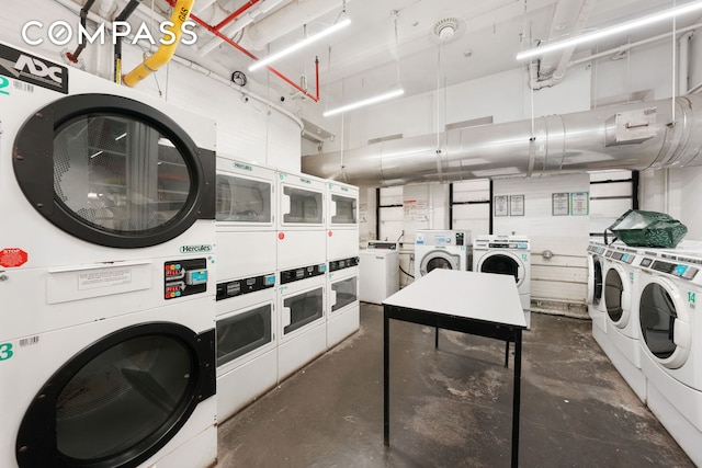 176 W 87th St Unit 1H, New York City, NY 10024 - shared laundry room with stacked washer and clothes dryer and washer and clothes dryer