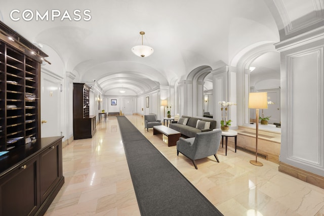 176 W 87th St Unit 1H, New York City, NY 10024 - common area featuring a decorative wall and lofted ceiling