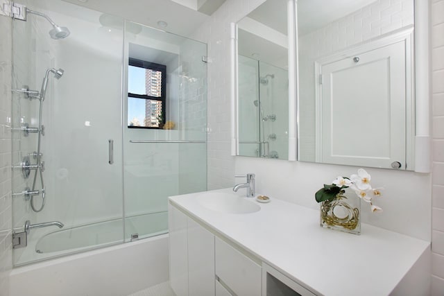 325 E 72nd St Unit 12C, New York City, NY 10021 - full bath featuring enclosed tub / shower combo and vanity