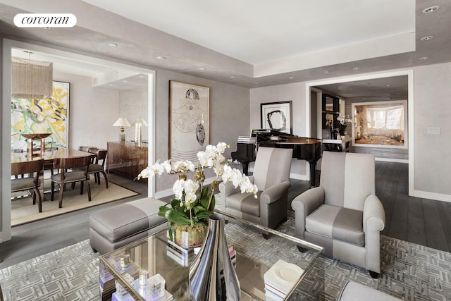 408 E 79th St Unit 9A, New York City, NY 10075 - living area with baseboards, wood finished floors, recessed lighting, and a tray ceiling