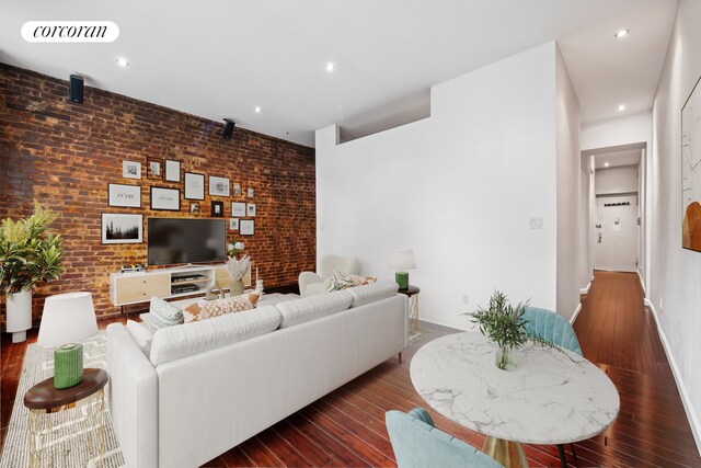 324 E 50th St Unit 4D, New York City, NY 10022 - living room with hardwood / wood-style floors and recessed lighting