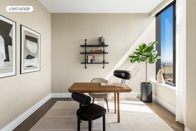430 E 58th St Unit 65A, New York City, NY 10022 - home office featuring wood finished floors and baseboards