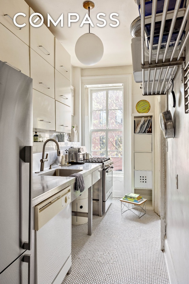 294 Hicks St Unit 2, New York City, NY 11201 - kitchen with appliances with stainless steel finishes, light colored carpet, and light countertops