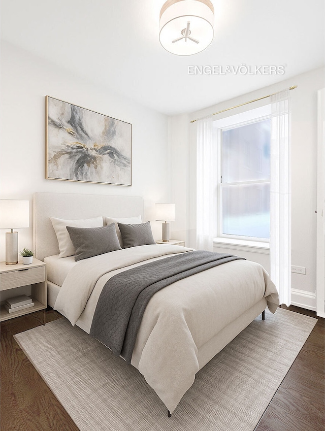 344 W 72nd St Unit 203, New York City, NY 10023 - bedroom featuring wood finished floors and baseboards