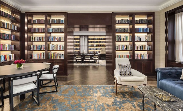 344 W 72nd St Unit 203, New York City, NY 10023 - sitting room with wall of books and crown molding