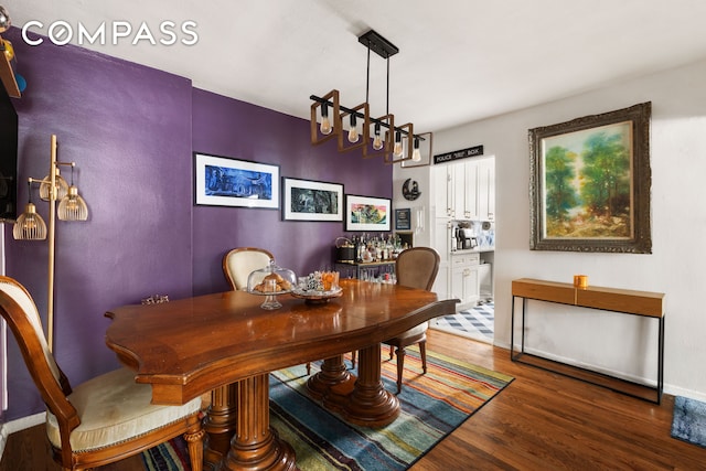 495 E 7th St Unit 2F, New York City, NY 11218 - dining area with wood finished floors and baseboards