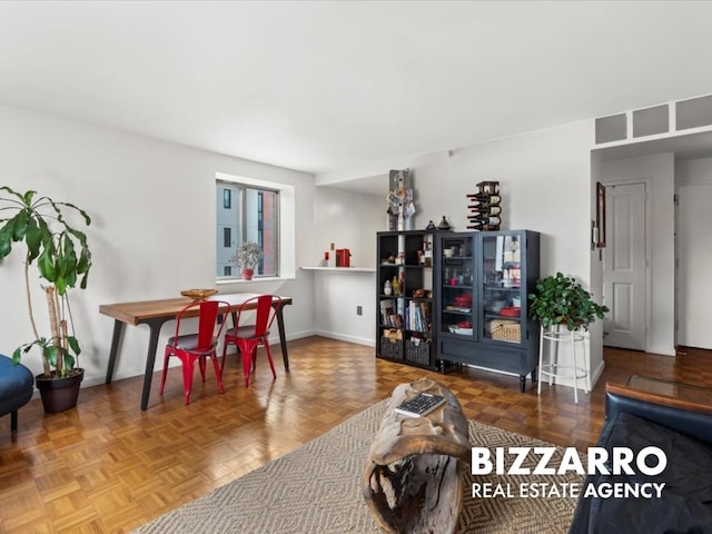 300 W 135th St Unit 8A, New York City, NY 10030 - living area with baseboards
