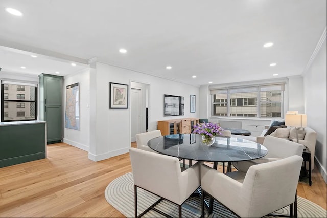 233 E 69th St Unit 11-B, New York City, NY 10021 - dining area featuring ornamental molding, baseboards, light wood-style floors, and recessed lighting