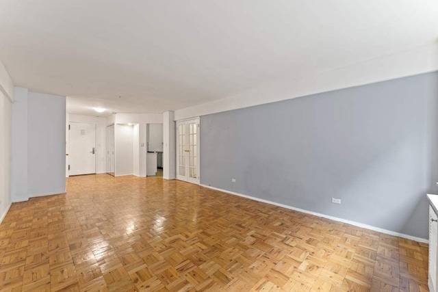 420 E 64th St Unit E5A, New York City, NY 10065 - unfurnished room with baseboards
