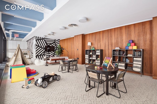 184 Kent Ave Unit B404, New York City, NY 11249 - carpeted dining area with wood walls