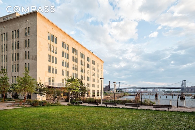 184 Kent Ave Unit B404, New York City, NY 11249 - view of building exterior with a water view