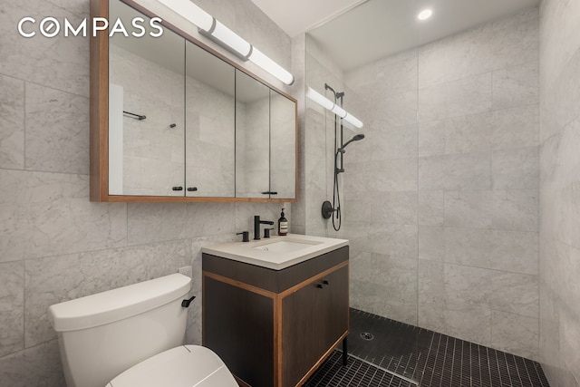 184 Kent Ave Unit B404, New York City, NY 11249 - full bath with toilet, tile walls, walk in shower, vanity, and tile patterned floors