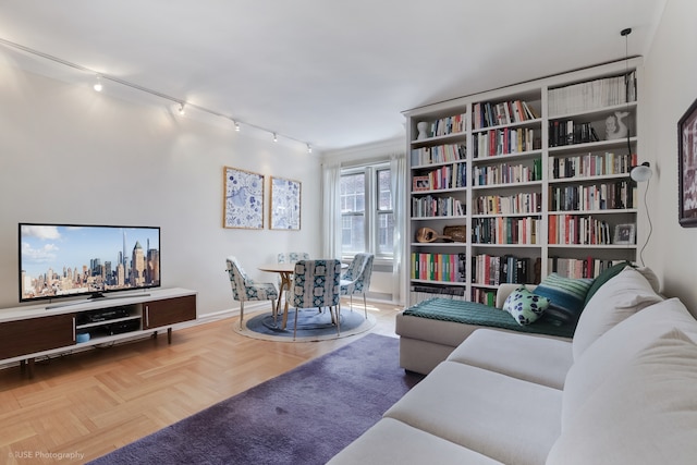 601 E 19th St Unit 6C, New York City, NY 11226 - living room with track lighting and baseboards