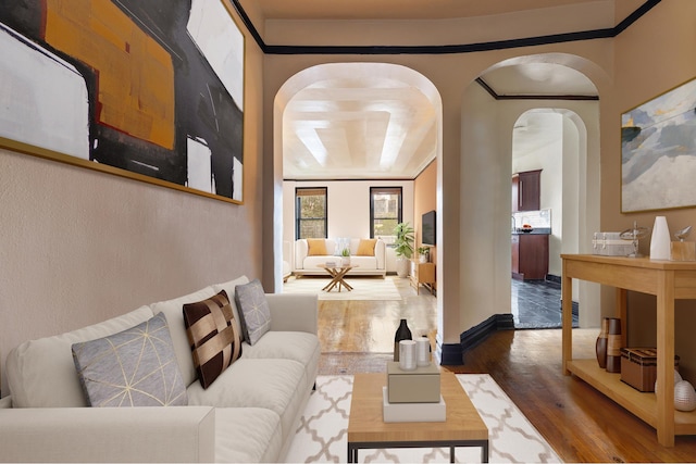 50 Lefferts Ave Unit 4F, New York City, NY 11225 - living room featuring arched walkways, wood finished floors, and baseboards