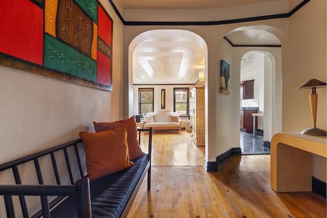 50 Lefferts Ave Unit 4F, New York City, NY 11225 - corridor featuring wood finished floors, arched walkways, and baseboards