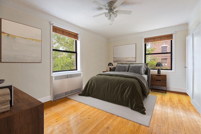 50 Lefferts Ave Unit 4F, New York City, NY 11225 - bedroom featuring radiator, light wood-type flooring, baseboards, and a ceiling fan