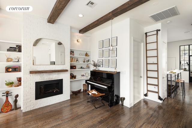61 Engert Ave Unit 1, New York City, NY 11222 - living room featuring wood finished floors, beam ceiling, a fireplace, built in features, and a barn door