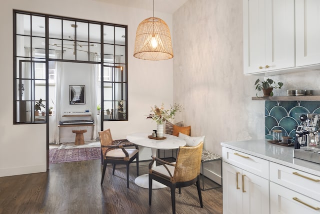 61 Engert Ave Unit 1, New York City, NY 11222 - dining room with baseboards and dark wood-type flooring