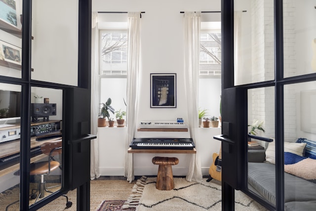 61 Engert Ave Unit 1, New York City, NY 11222 - living area featuring healthy amount of natural light and baseboards