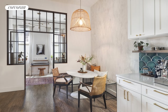 61 Engert Ave Unit 1, New York City, NY 11222 - dining space featuring baseboards and dark wood-type flooring