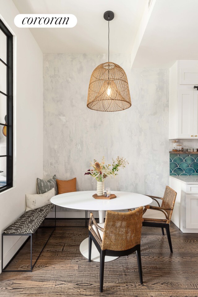 61 Engert Ave Unit 1, New York City, NY 11222 - living room featuring wood finished floors, beamed ceiling, a brick fireplace, and built in features
