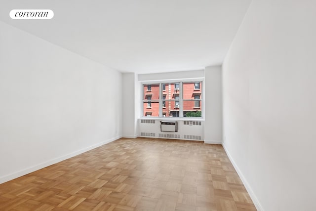 150 E 77th St Unit 3D, New York City, NY 10075 - empty room with baseboards