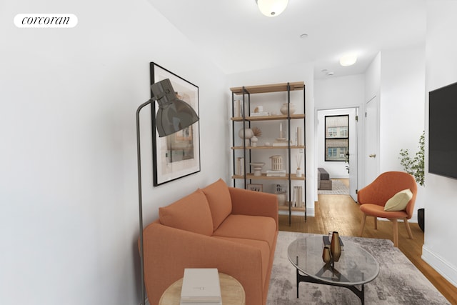 248 E 3rd St Unit 3B, New York City, NY 10009 - living area featuring wood finished floors and baseboards