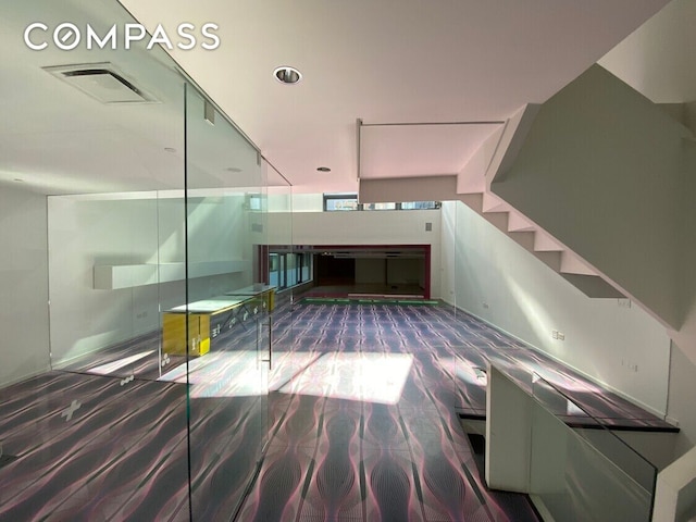 428 W 54th Street Retail, New York City, NY 10019 - staircase featuring wood finished floors