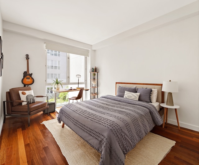 125 N 10th St Unit N2D, New York City, NY 11249 - bedroom featuring wood finished floors and baseboards