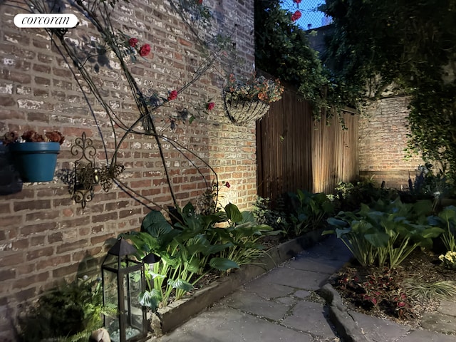 252 W 21st St Garden, Unit Garden, New York City, NY 10011 - view of side of home with brick siding