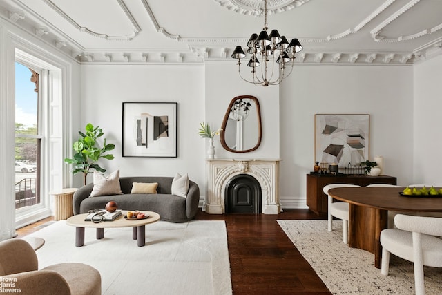 272 Lafayette Ave, New York City, NY 11238 - living room featuring wood finished floors, a chandelier, and a fireplace