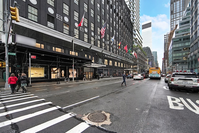 115 E 61st St Unit 10A, New York City, NY 10065 - view of asphalt road with a view of city, street lighting, and sidewalks