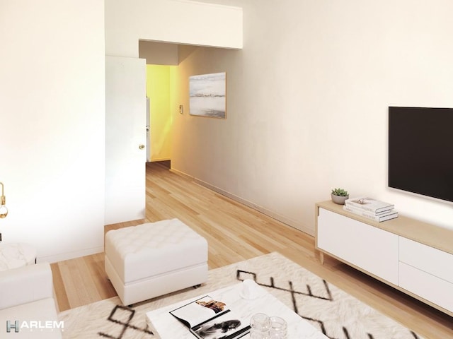 157 W 123rd St Unit 2H, New York City, NY 10027 - living area with light wood-style floors and baseboards