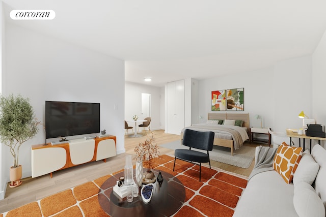 145 E 15th St Unit 2D, New York City, NY 10003 - living room with light wood-style floors and recessed lighting