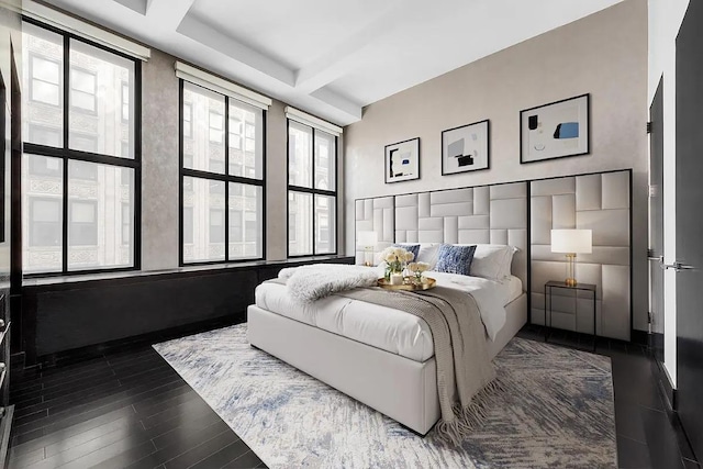 254 Park Ave S Unit 9D, New York City, NY 10010 - bedroom with wood finished floors and beam ceiling