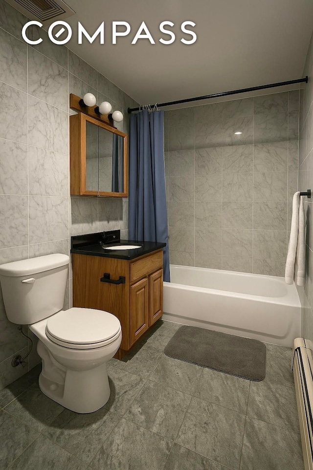 31 Monroe St Unit 9B, New York City, NY 10002 - bathroom featuring a baseboard radiator, vanity, toilet, shower / bath combo with shower curtain, and tile walls