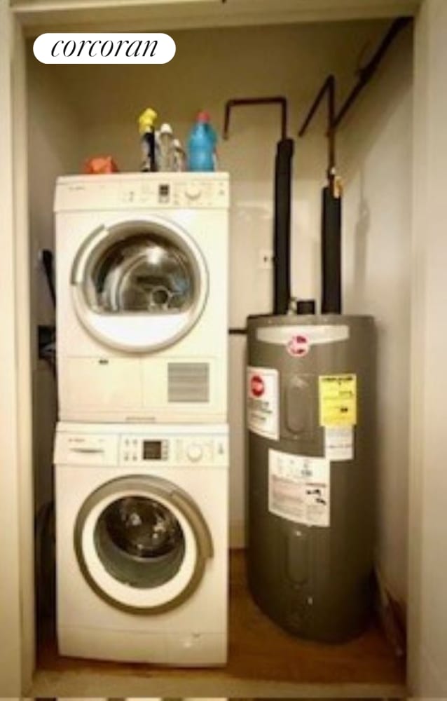 103 Quentin Rd Unit B503, New York City, NY 11223 - washroom with stacked washer / dryer and water heater