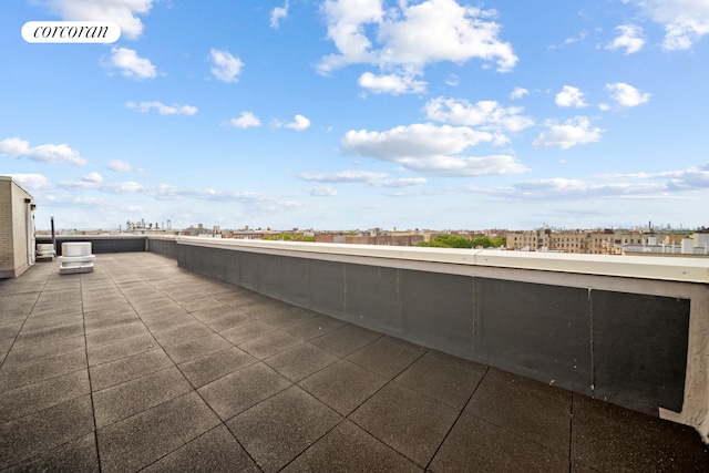 103 Quentin Rd Unit B503, New York City, NY 11223 - view of patio featuring a view of city