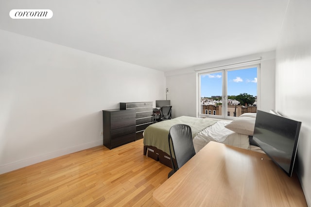 103 Quentin Rd Unit B503, New York City, NY 11223 - bedroom with light wood-type flooring and baseboards